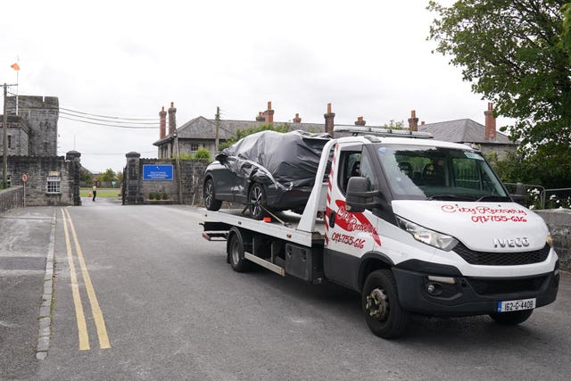 A car being removed from the scene