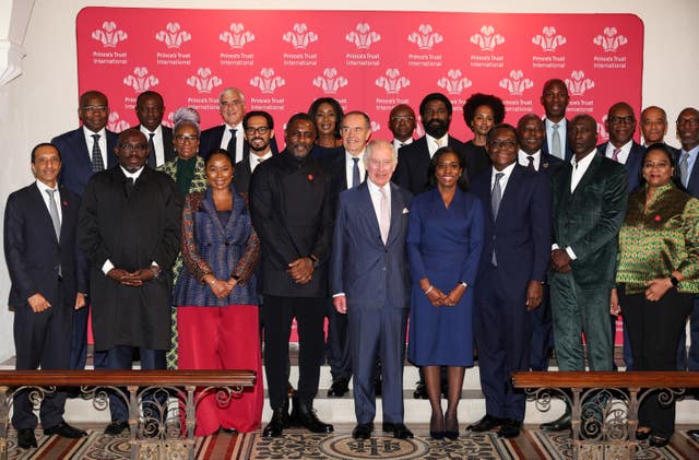 Charles, centre, poses with guests during a reception and discussion to learn about opportunities for young people and the role of entrepreneurship in Africa at Garrison Chapel in London on Wednesday