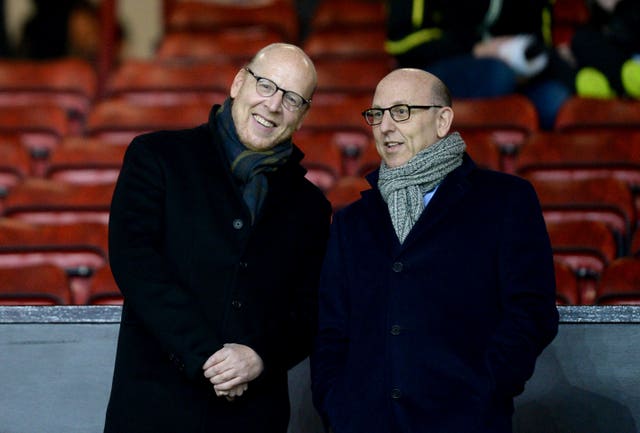 Joel Glazer (right) admits United got it wrong over the European Super League