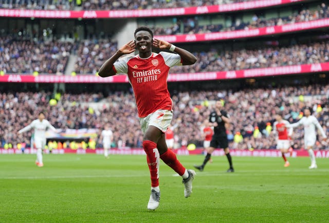 Arsenal’s Bukayo Saka scoring away to Tottenham