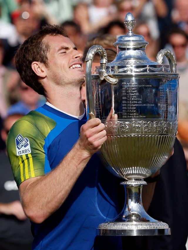 Andy Murray lifts the trophy at Queen's Club