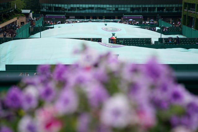 Covers on the outer courts as rain fell
