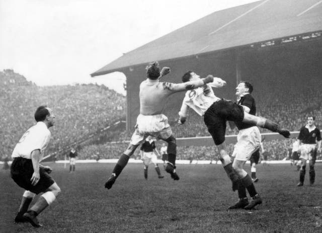 Scotland goalkeeper Bobby Brown beats England’s Nat Lofthouse to the ball 