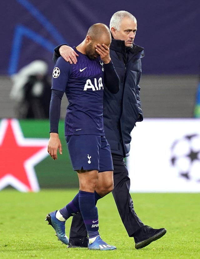 Jose Mourinho consoles Lucas Moura, left, after Spurs' Champions League defeat to Leipzig