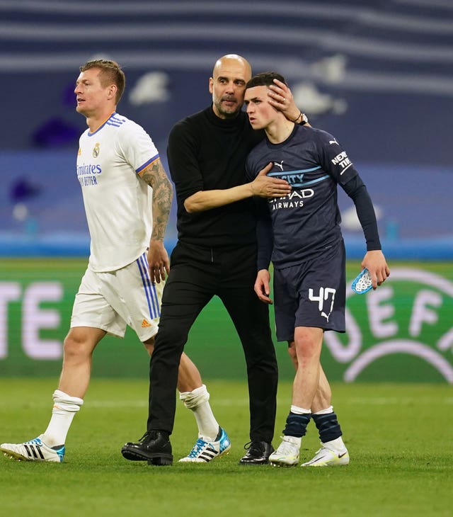 Guardiola consoles Phil Foden after City were stunned by Real Madrid's fightback