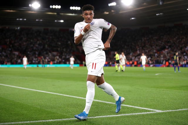 Jadon Sancho celebrates scoring for England against Kosovo