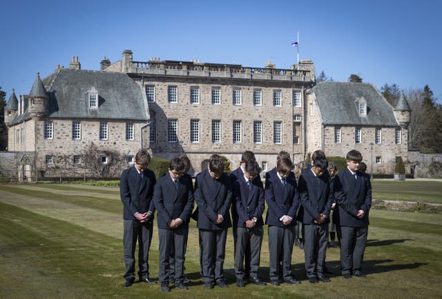 Pupils at the Duke of Edinburgh’s former school, Gordonstoun in Moray, observe the one-minute silence on the day of his funeral