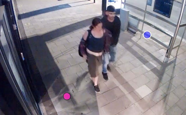 CCTV of Lorraine Cox walking with Azam Mangori 