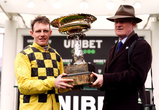 Paul Townend and Willie Mullins with the trophy