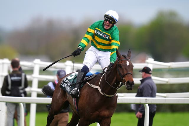 Paul Townend celebrates winning the Grand National with I Am Maximus