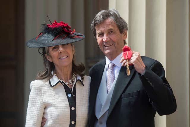 Author and broadcaster Melvyn Bragg, with Gabriel Clare-Hunt, following an investiture ceremony at Buckingham Palace (Victoria Jones/PA)