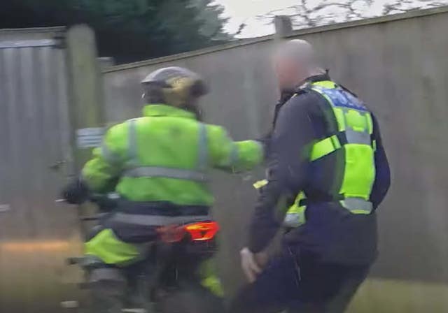 A screengrab taken from video footage of Kieran Jones on his motorbike after he was stopped by police