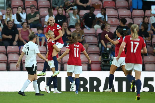 Frida Maanum, top, celebrates her goal against Northern Ireland