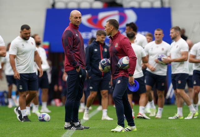 Kevin Sinfield held talks over his future with Steve Borthwick (left) during the Six Nations  