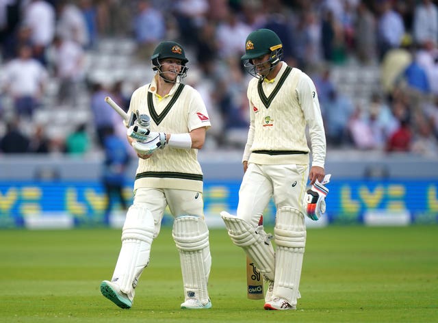 Steve Smith and Alex Carey remain at the crease for Australia