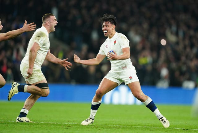 England’s Marcus Smith celebrates after he kicked the winning drop goal against Ireland in 2024