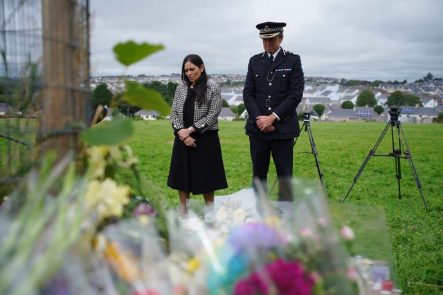 Home Secretary Priti Patel and Shaun Sawyer, the chief constable of Devon and Cornwall Police, were among those to pay their respects (Ben Birchall/PA)