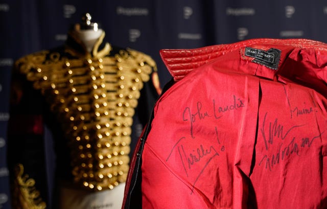 The signed red Thriller jacket worn in Michael Jackson's rehearsals for his tour 