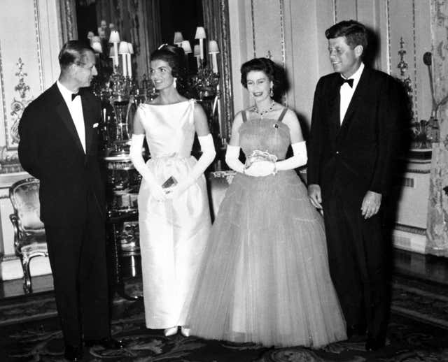 President John Kennedy (right) with his wife (second left) Jacqueline, meeting the Queen and the Duke of Edinburgh (PA)