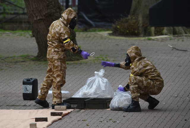 Military personnel at the site near the Maltings in Salisbury where Russian double agent Sergei Skripal and his daughter Yulia were found on a park bench (Ben Birchall/PA)