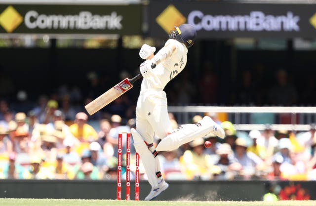 England’s Mark Wood avoids a bouncer during day four of the first Ashes test at The Gabba, Brisbane.