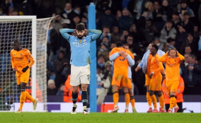 Manchester City’s Josko Gvardiol puts his hands on his head after Real Madrid score a late winner