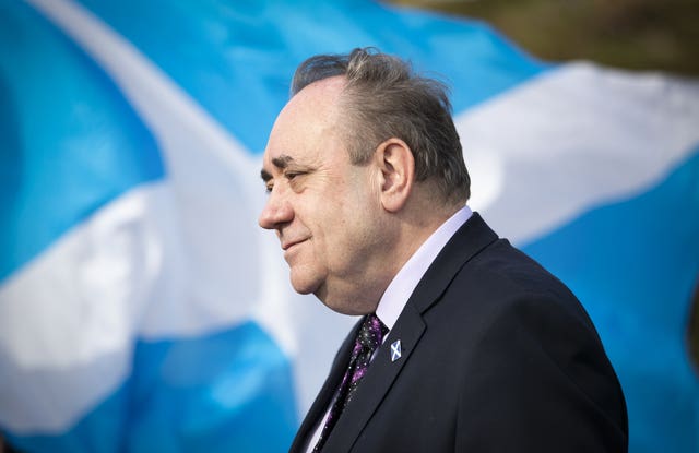 Salmond in front of a saltire