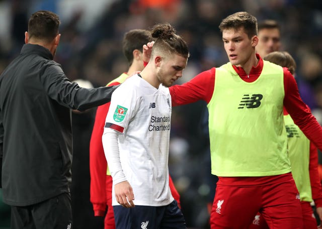 Harvey Elliott (centre) will not travel