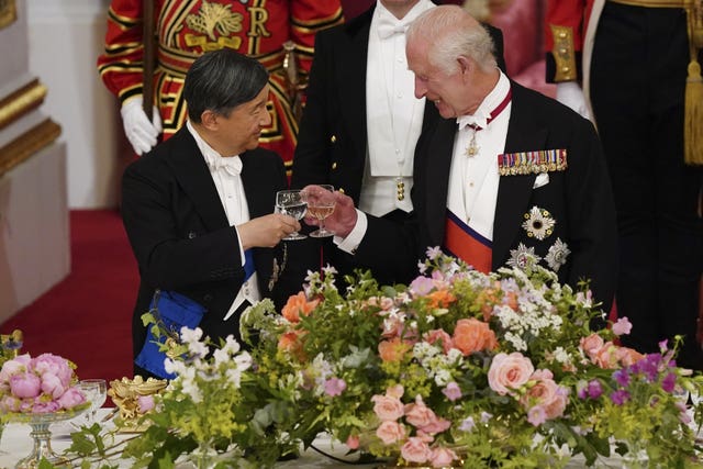 The King and Emperor Naruhito of Japan share a toast during the state banquet