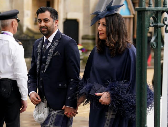 Humza Yousaf and his wife Nadia entering Westminster Abbey during the Coronation
