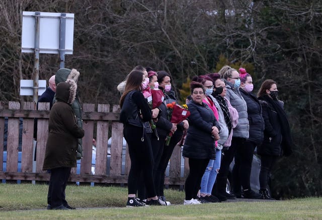 Mourners gather for the funeral