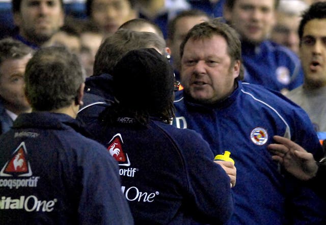 Wally Downes (right) , during his spell as Reading's first team coach, confronts Sheffield United manager Neil Warnock (centre) on the touchline.