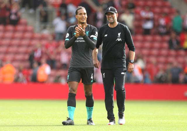 Jurgen Klopp, right, will be patient with Virgil Van Dijk (Steven Paston/PA)