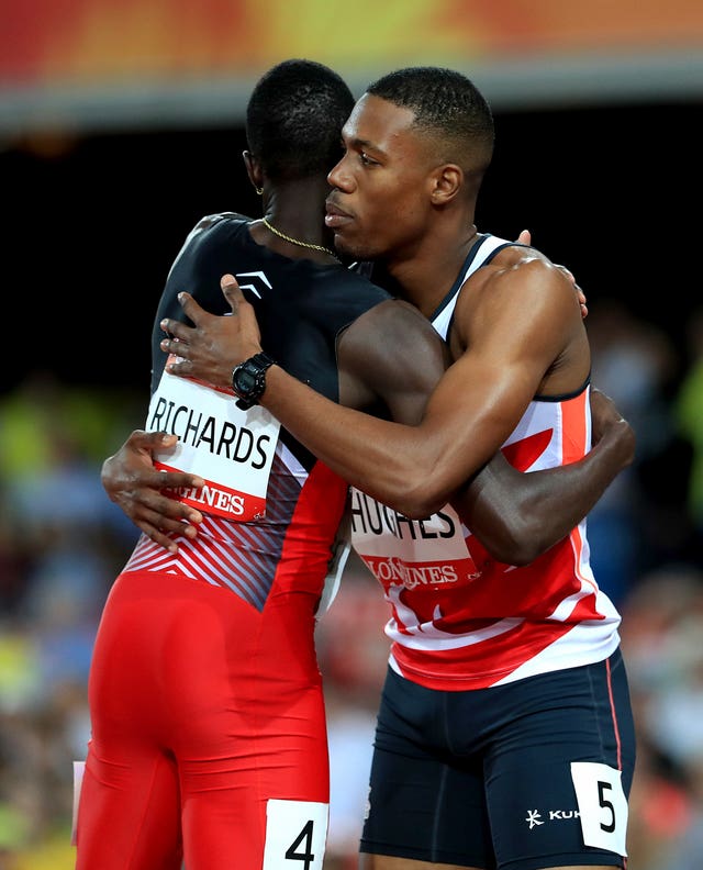 Trinidad and Tobago’s Jereem Richards (left) congratulates England's Zharnel Hughes for winning the men's 200 metres, before either of them learned that Hughes had been disqualfied for obstruction