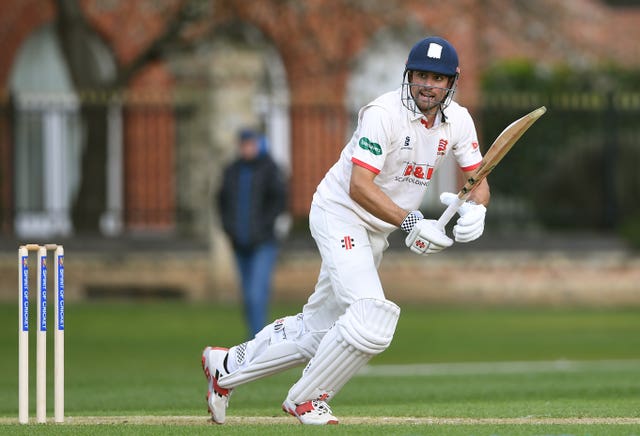 Alastair Cook runs on a cricket pitch