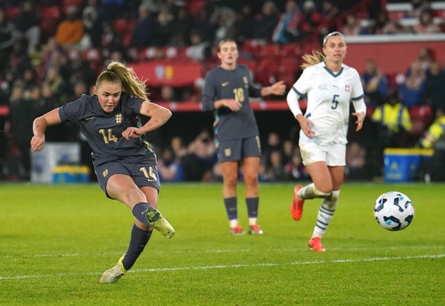 Georgia Stanway takes a shot with her right foot