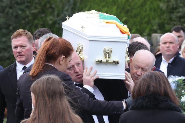 The coffin of Ronan Wilson is carried into St Mary’s Church, Dunamore, for his funeral