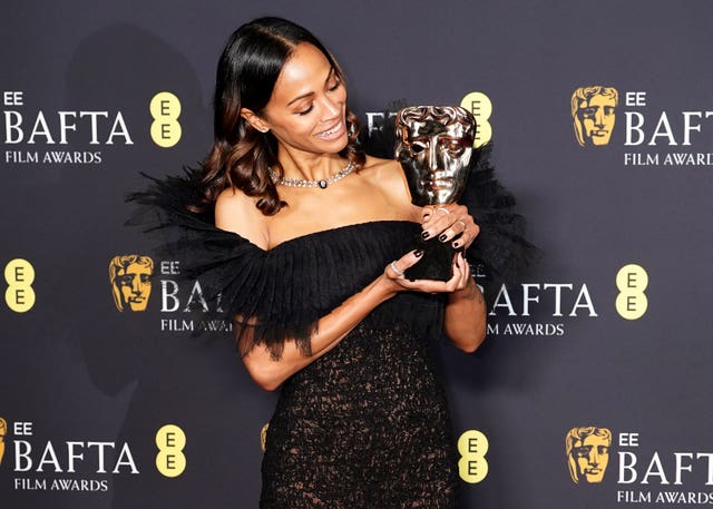 Zoe Saldana in the press room after winning the best actress in a supporting role award for Emilia Perez during the 78th British Academy Film Awards at the Royal Festival Hall, Southbank Centre, London 