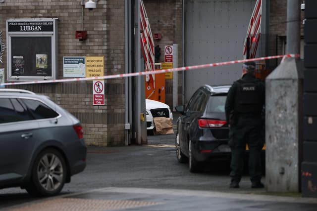 A white Audi car parked inside the police station in Lurgan, Co Armagh after a delivery driver was threatened at gunpoint and forced to drive with an object inside to the town&rsquo;s police station, sparking a security alert 