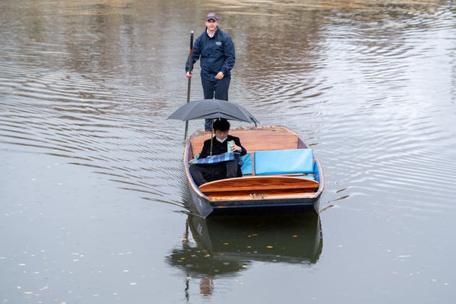 A man punting in Cambridge