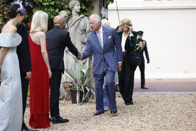 The King meets guests at the Animal Ball 