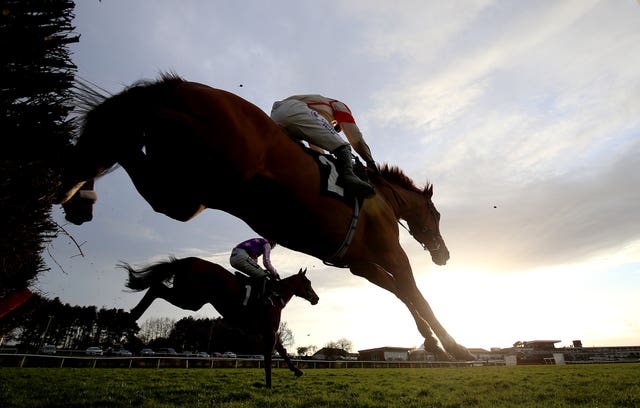 Racing will go behind closed doors at all meetings in Britain from Tuesday
