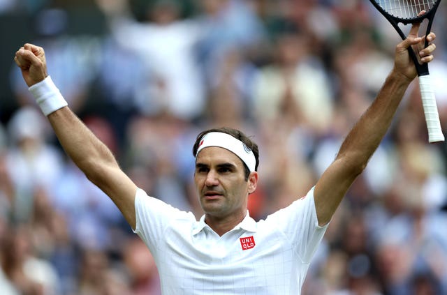 Roger Federer celebrates victory against Cameron Norrie
