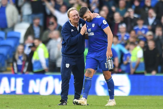 Cardiff City manager Neil Warnock (left) has used Callum Paterson as a make-shift striker in recent weeks