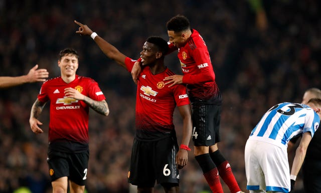 Paul Pogba celebrates his second in Manchester United's 3-1 win against Huddersfield in Ole Gunnar Solskjaer's first home game in charge 