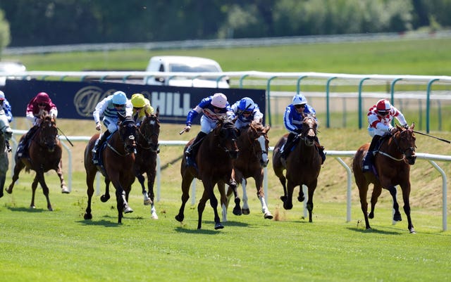 Morcar (pink hat) came through strongly to win