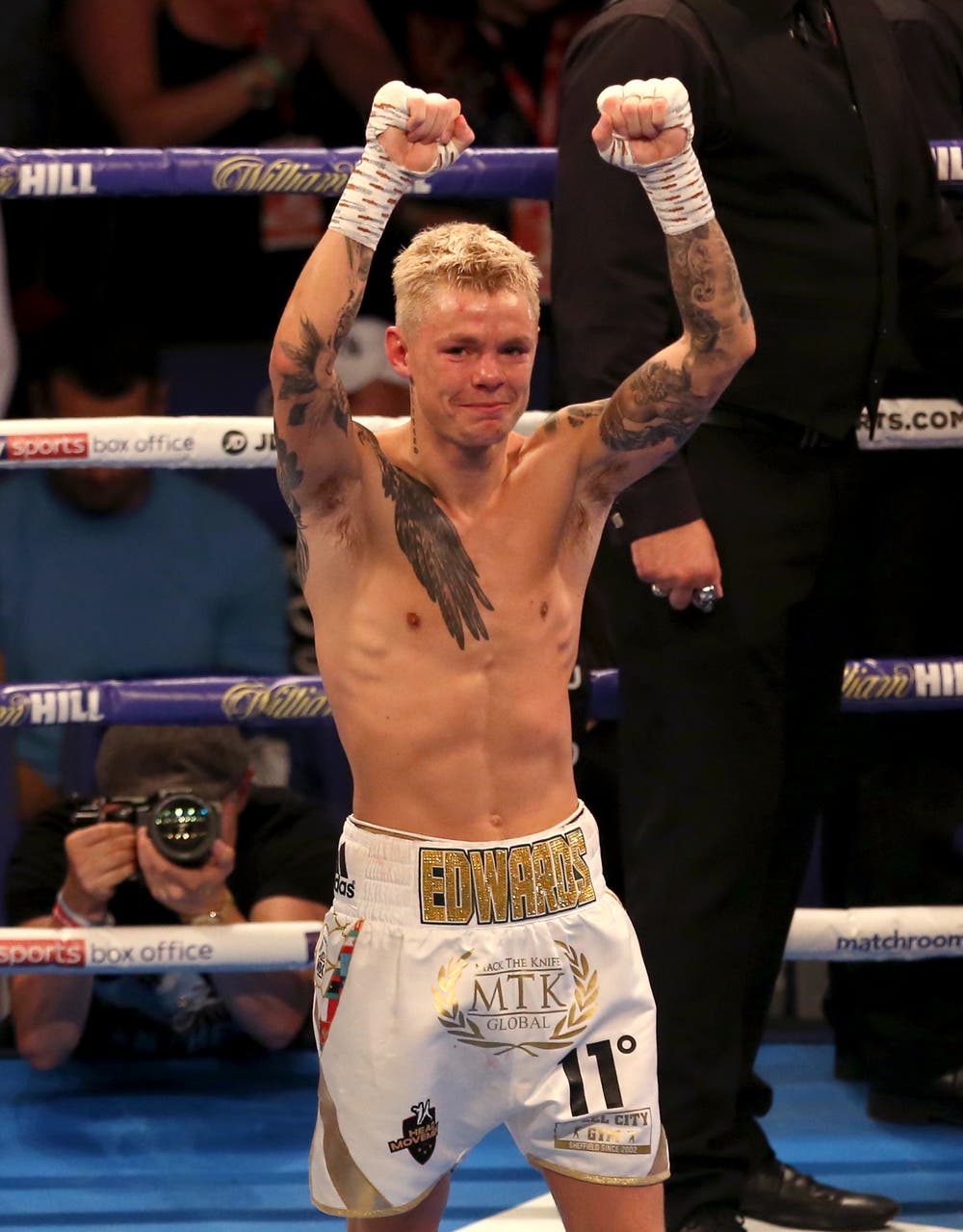 Charlie Edwards retains title after being knocked out by illegal punch ...