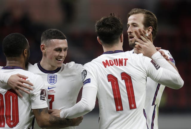 Mason Mount celebrates with his England team-mates after scoring in Tirana