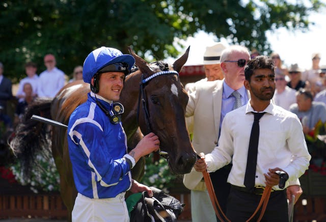 Venetian Sun and jockey Clifford Lee after winning the Duchess Of Cambridge Stakes at Newmarket 