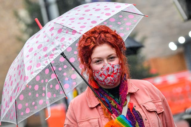 Face masks are likely to be required in shops and public places (Ben Birchall/PA)
